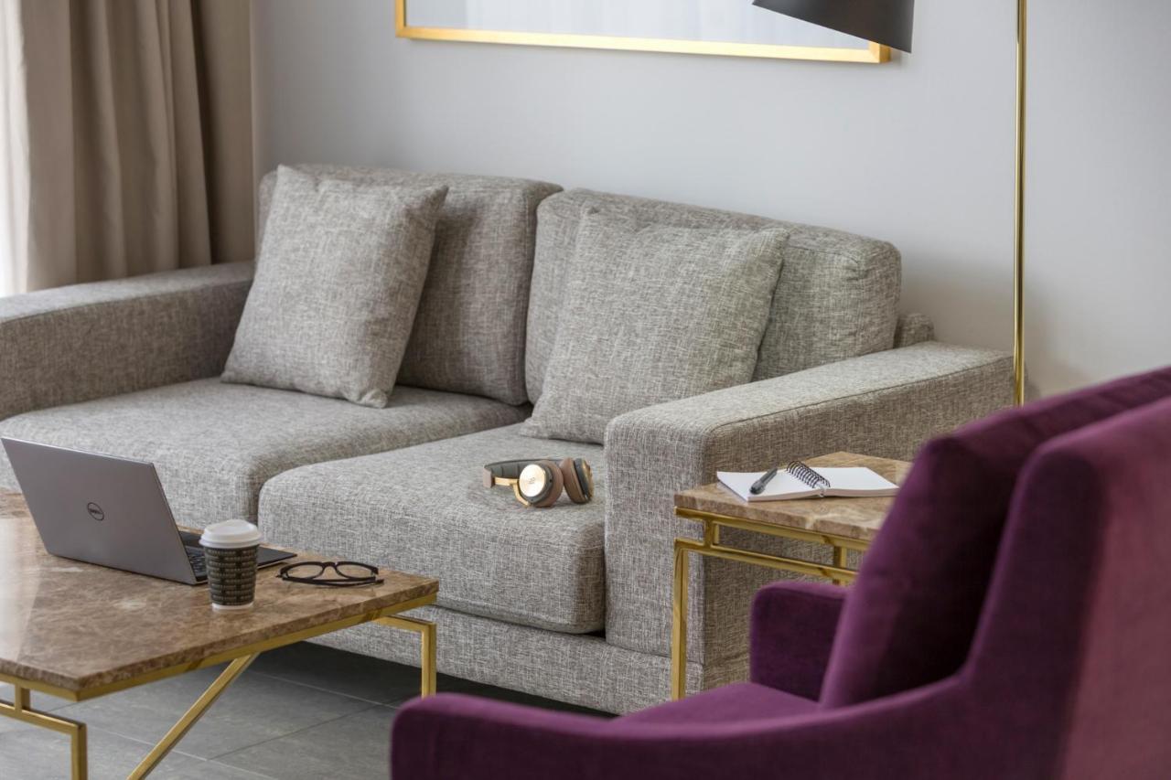 Meriton Suites Pitt Street, Σίδνεϊ Εξωτερικό φωτογραφία A sofa