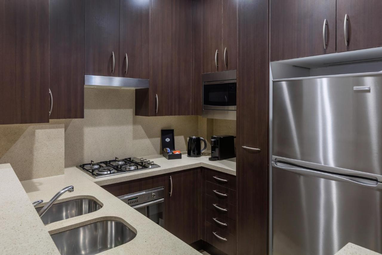Meriton Suites Pitt Street, Σίδνεϊ Εξωτερικό φωτογραφία A typical kitchen in a serviced apartment